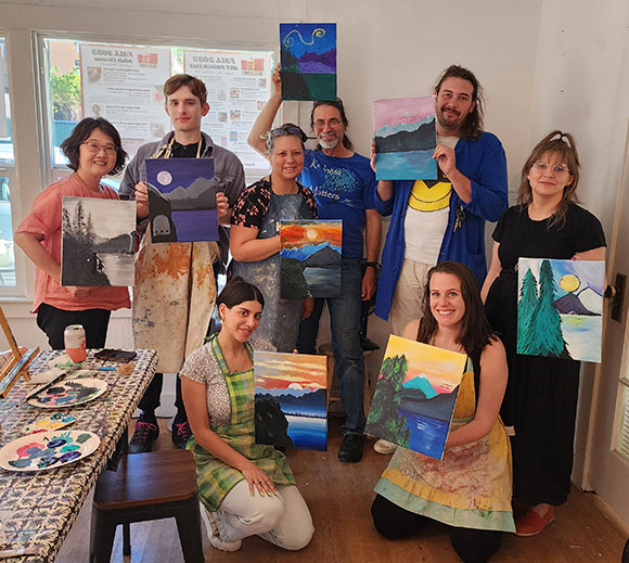 Photo of our group of TheraThrive therapists together holding up their art work at The Art Room in Lafayette, CA