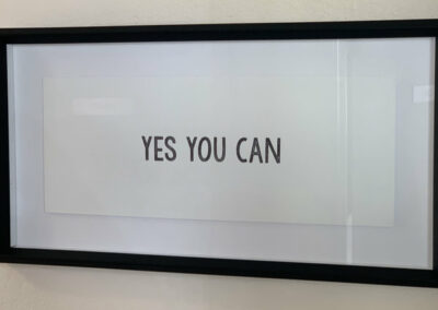 Photo of a picture that reads, "Yes You Can." (We believe in you).