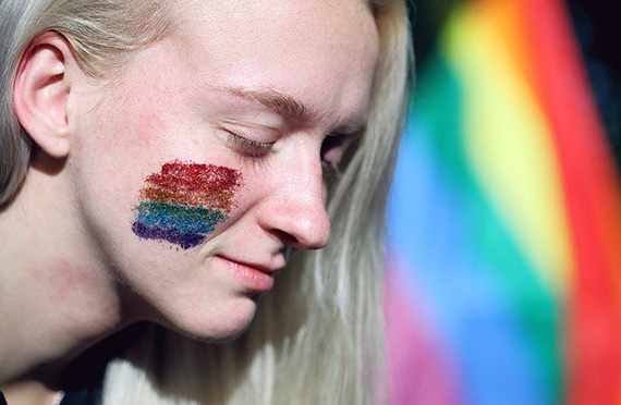 Photo of a person at a LGBTQ+ pride celebration