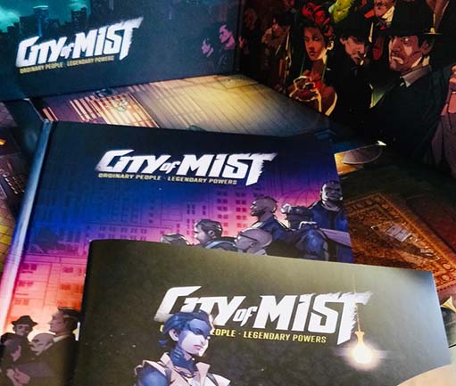 Photo of City of Mist RPG books, photo taken at TheraThrive's Lafayette office
